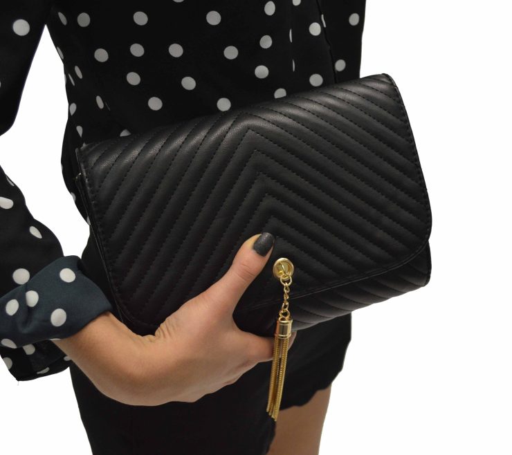 A photo of the Crossbody Clutch (Click for More Colors) product