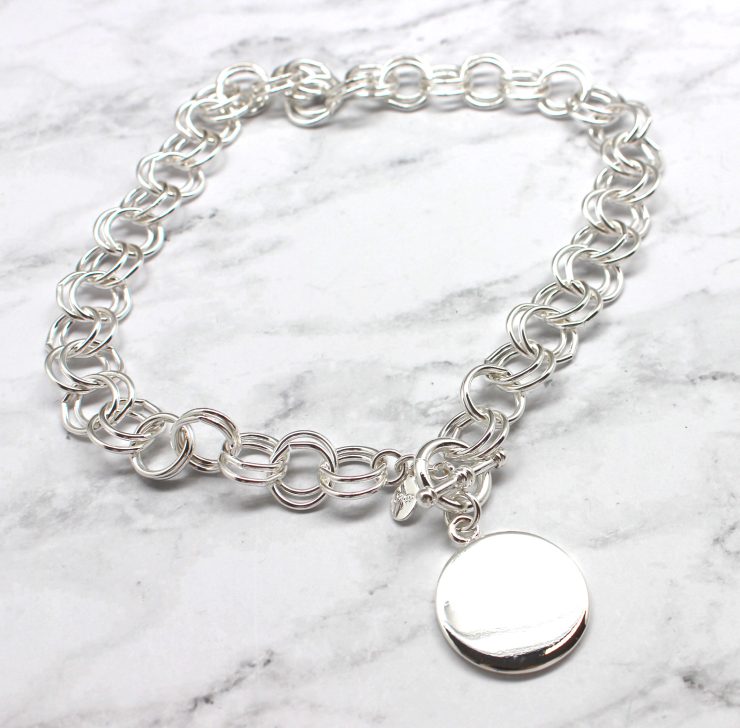 A photo of the Silver Toggle Bar Circle Necklace product