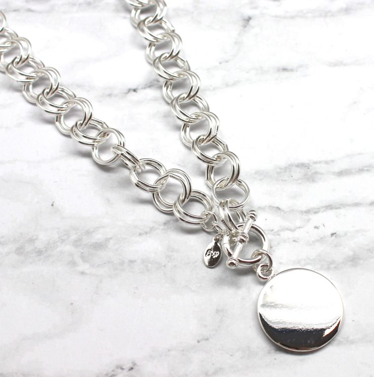 A photo of the Silver Toggle Bar Circle Necklace product