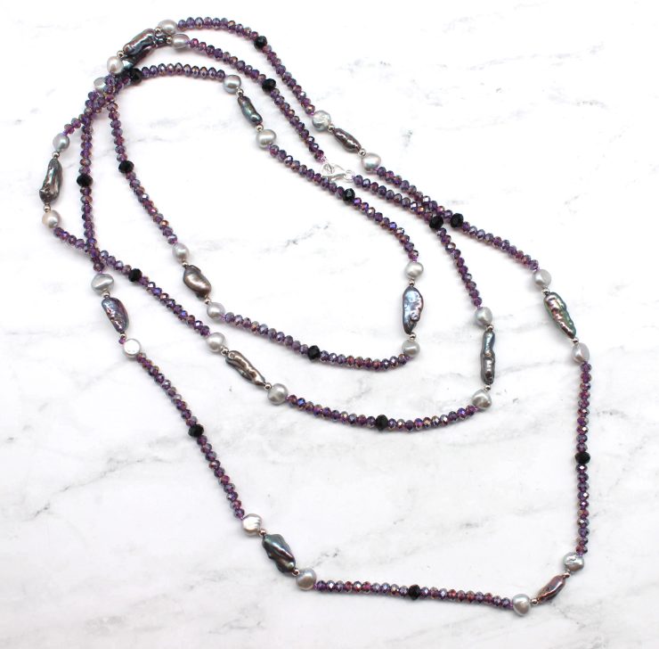 A photo of the Grey Pearls Necklace product