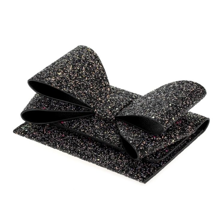 A photo of the Big Bow Galaxy Glitter Clutch product