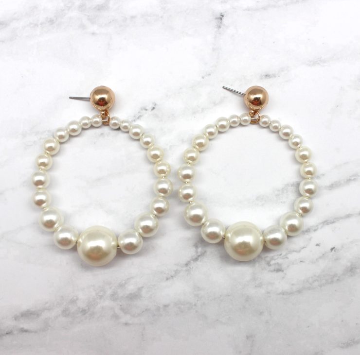 A photo of the Ring of Pearls Earring product