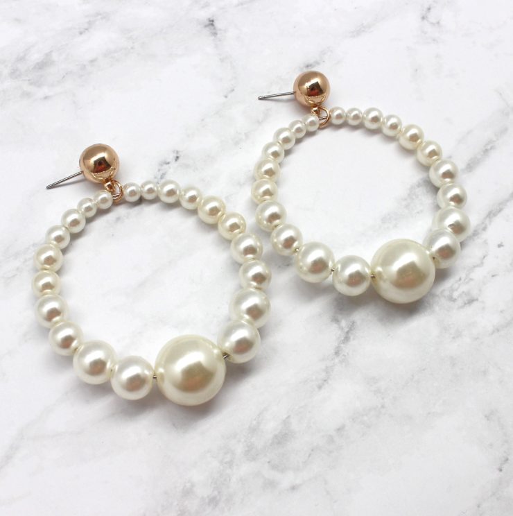 A photo of the Ring of Pearls Earring product