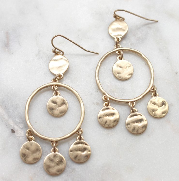 A photo of the Gold Dream Catcher Earrings product