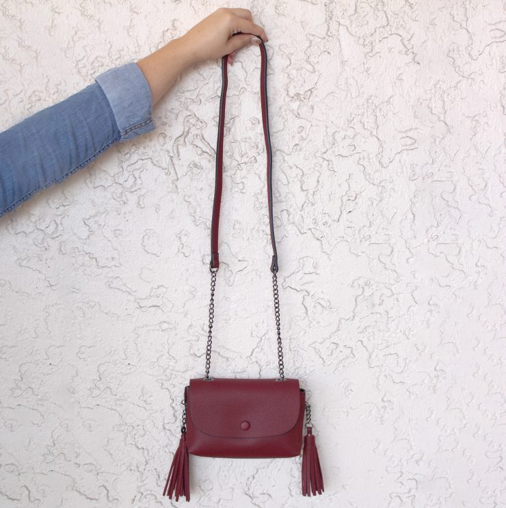 A photo of the Total Tassel Cross Body Bag product