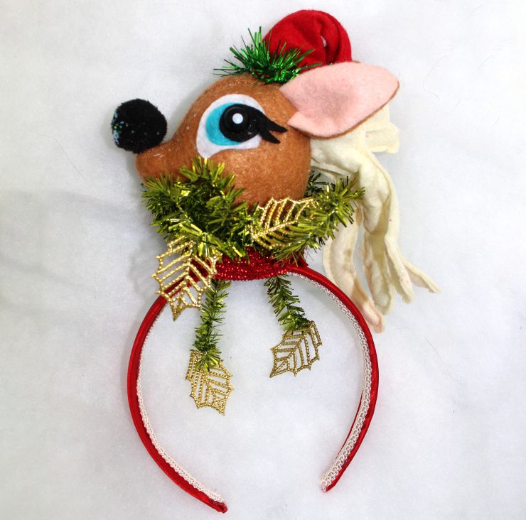 A photo of the Reindeer Headband product