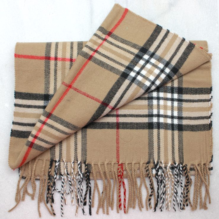 A photo of the Proper Plaid Pattern Scarf product