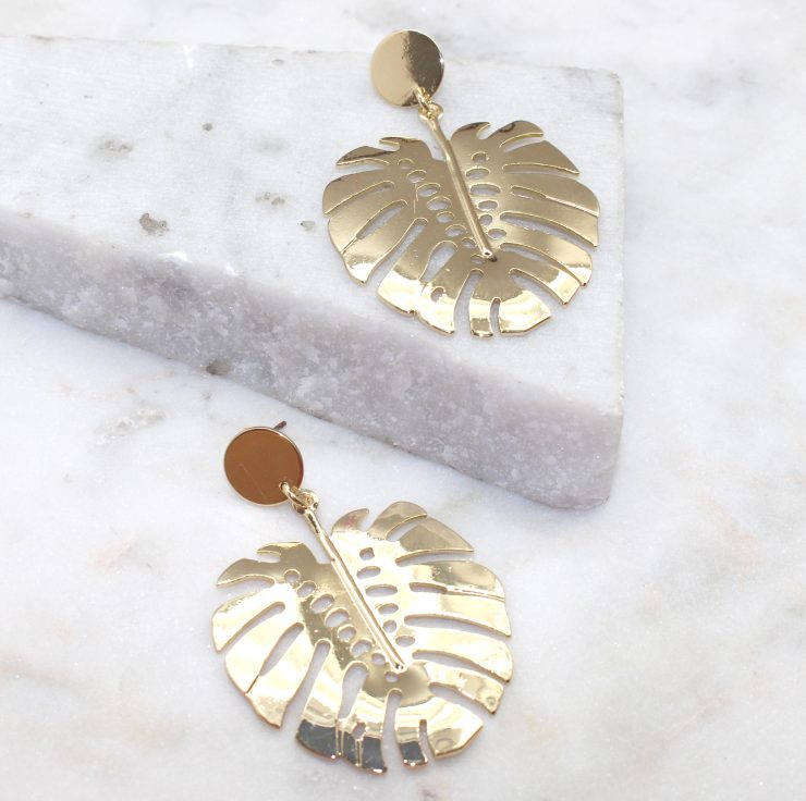 A photo of the Banana Leaf Earrings product