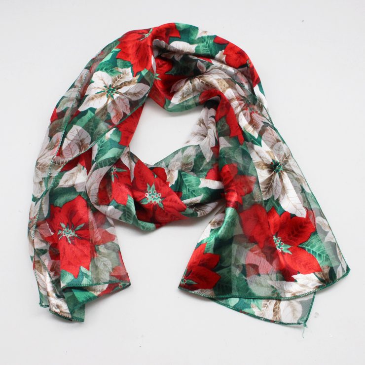 A photo of the Poinsettia Scarf product