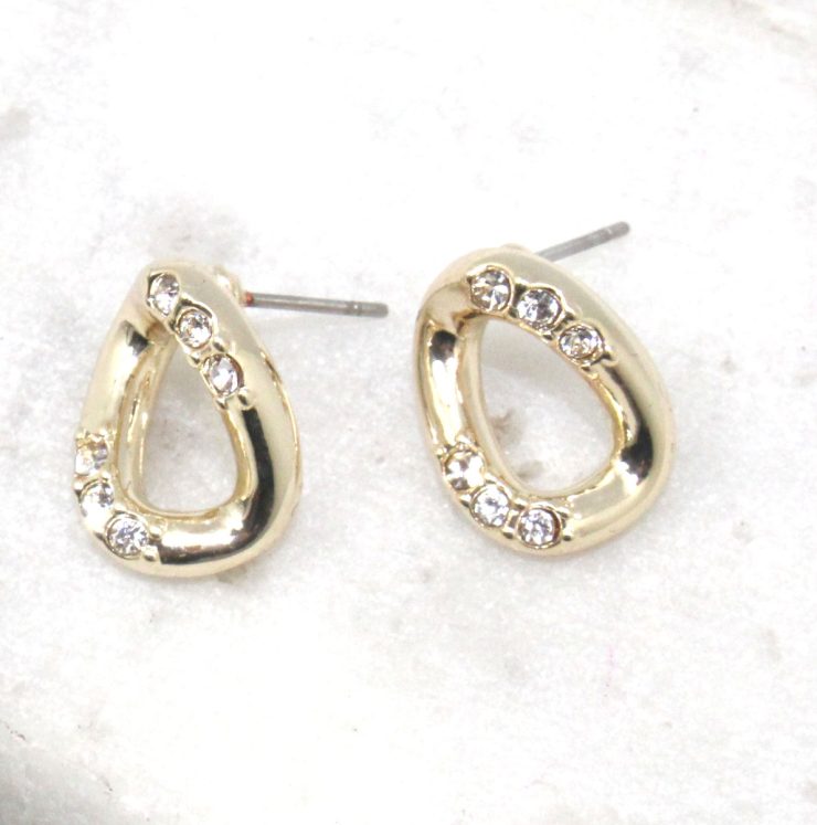 A photo of the Gold Link Stud Earrings product