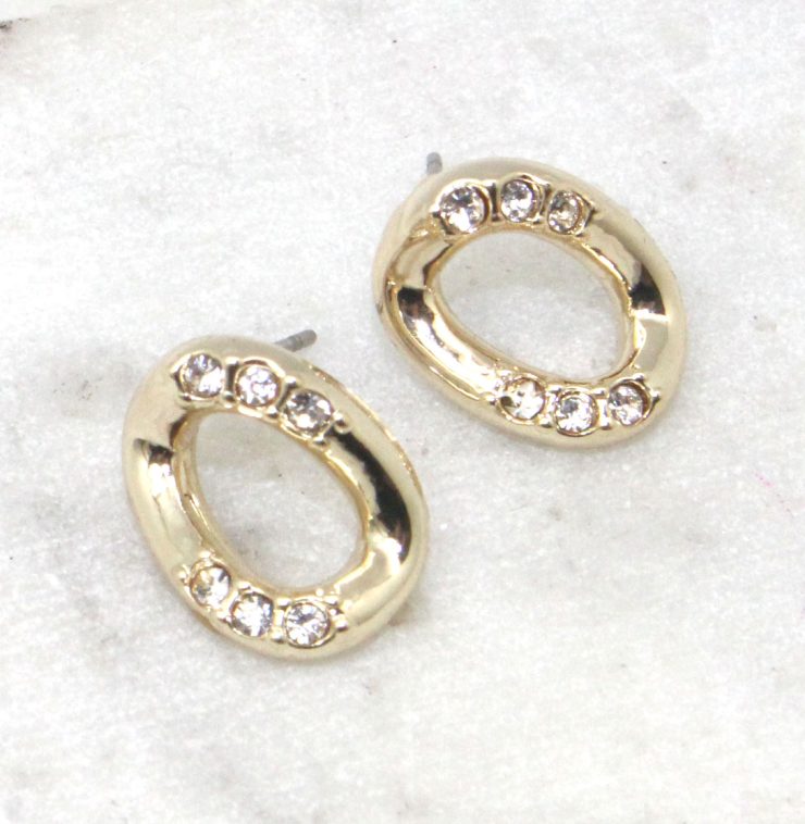 A photo of the Gold Link Stud Earrings product