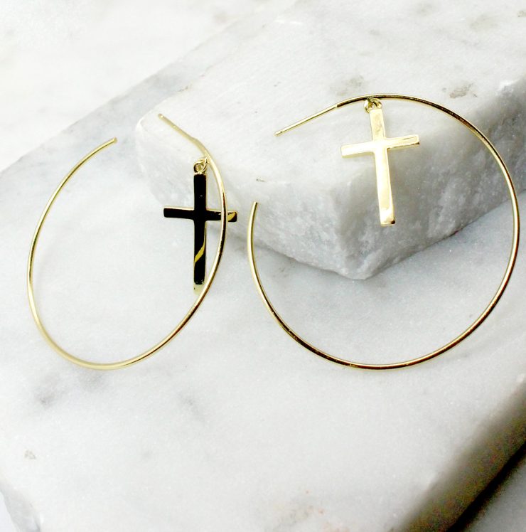 A photo of the Cross Hoop Earrings product