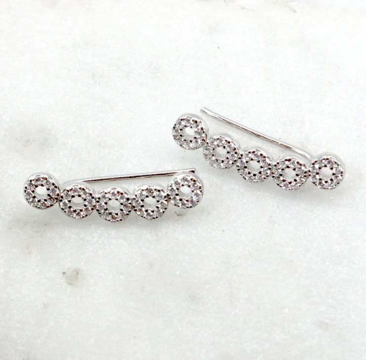 A photo of the Rhinestone Climber Earrings product