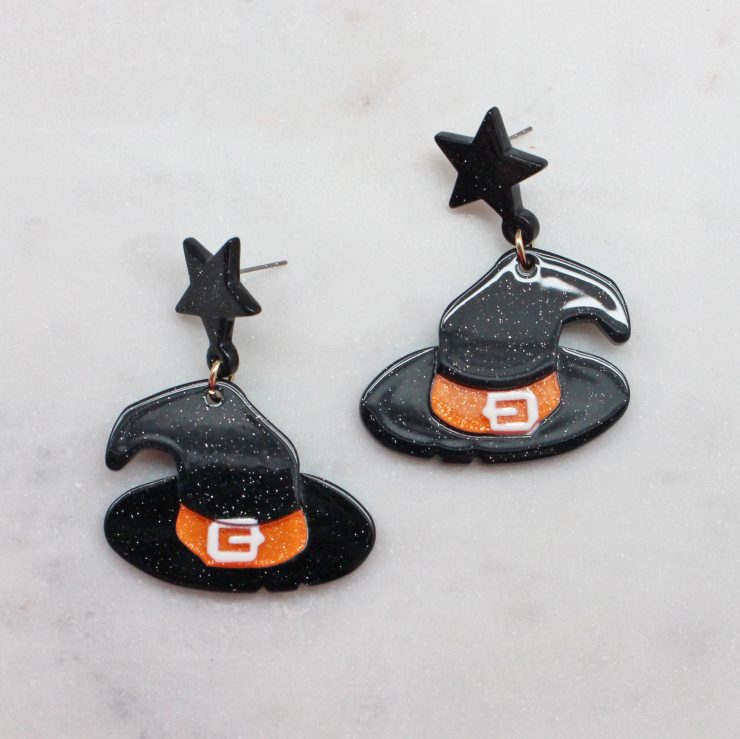 A photo of the Wicked Witch Hat Earrings product