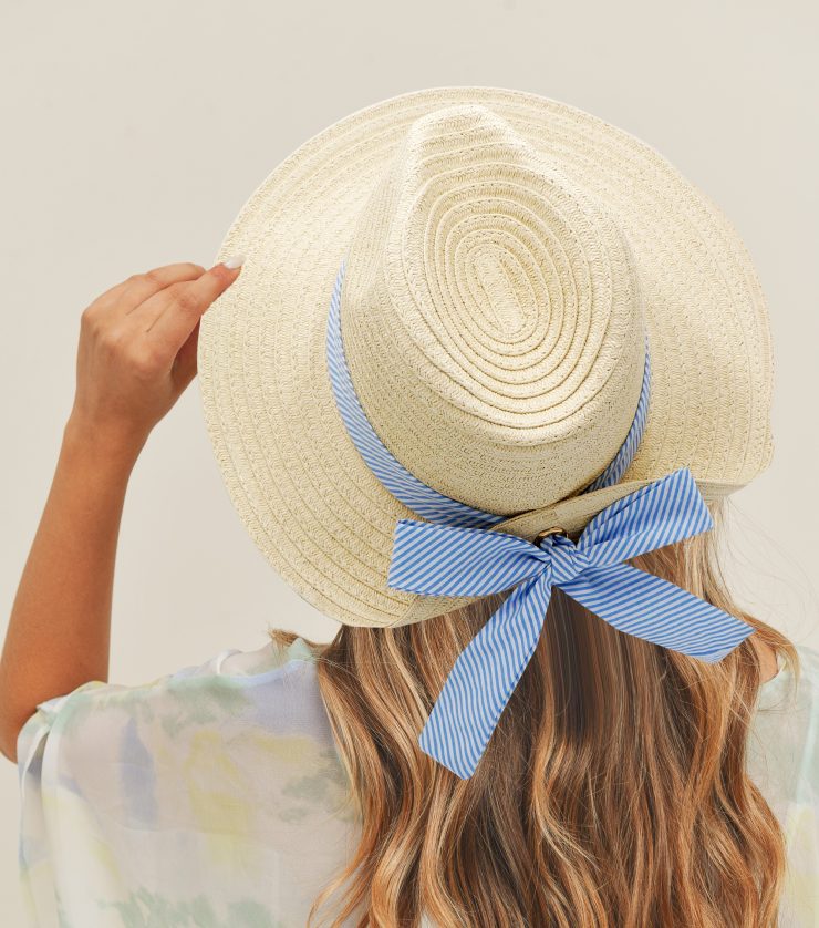 A photo of the Blue Striped Bow Hat In Beige product