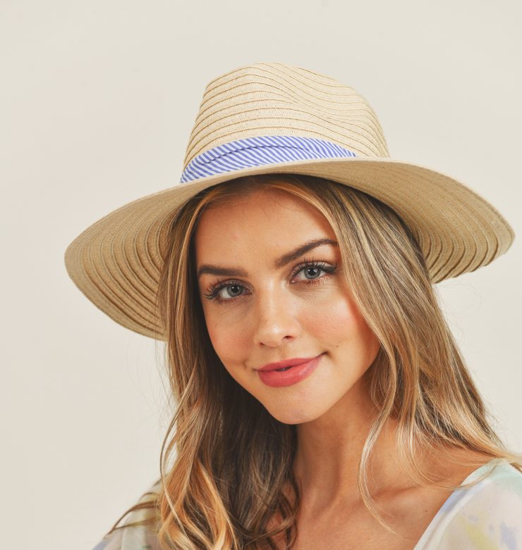 A photo of the Blue Striped Bow Hat In Beige product