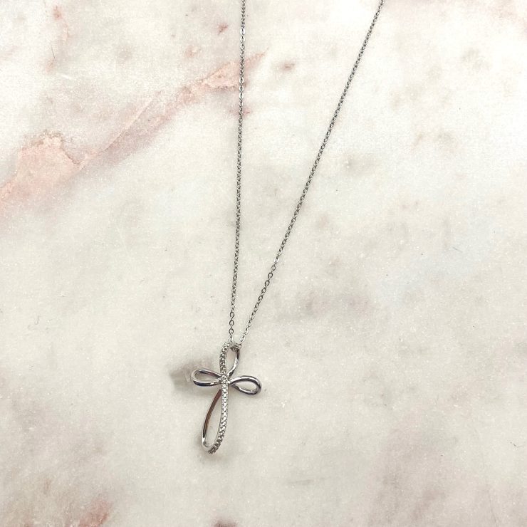 A photo of the Open Cross Necklace product