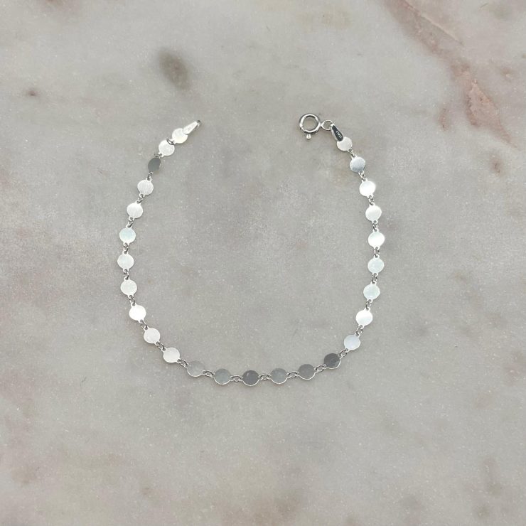 A photo of the Italian Round Disc Charm Bracelet product