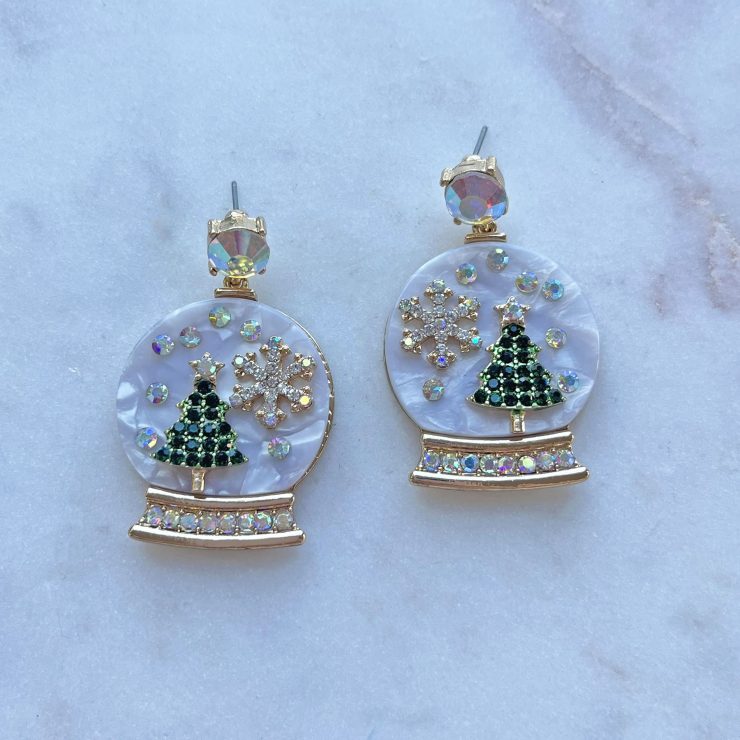 A photo of the Christmas Snow Globe Earrings product