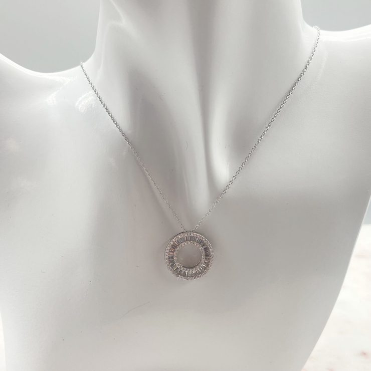 A photo of the Circle of Diamonds Necklace product