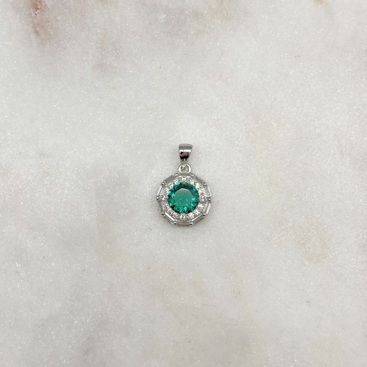 A photo of the Round Emerald CZ Pendant product