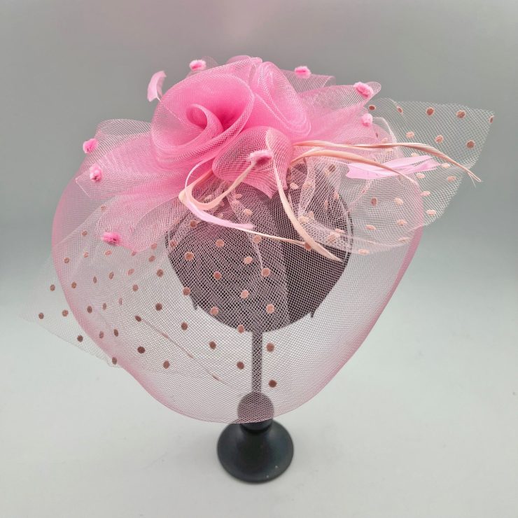 A photo of the Flora Fascinator in Light Pink product