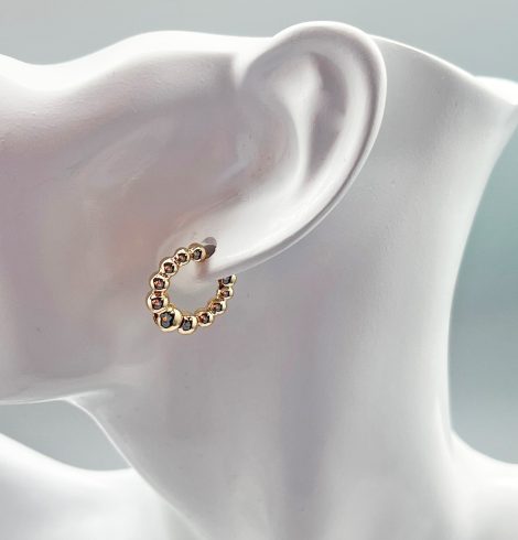 A photo of the Bubble Hoop Earrings in Gold product
