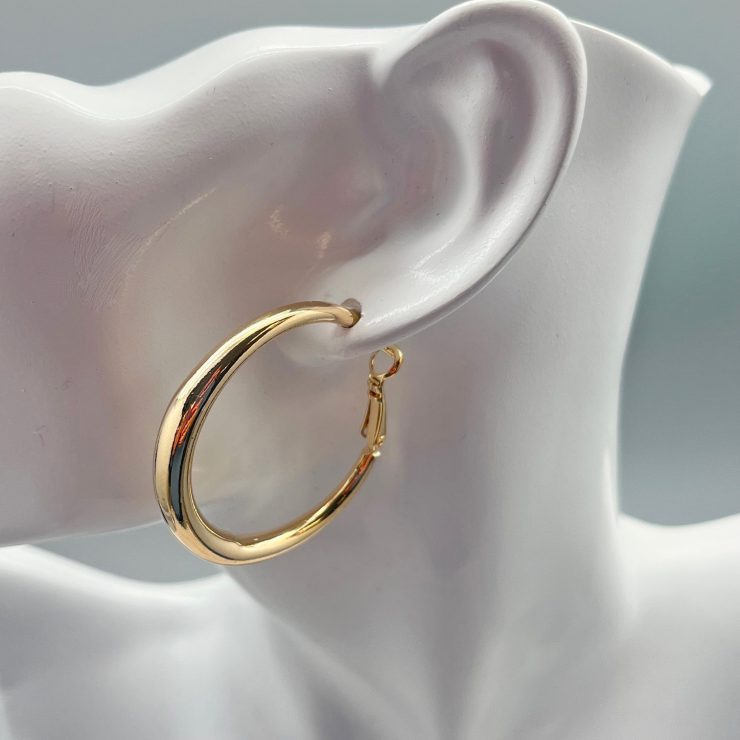 A photo of the Classic Hoops in Gold product