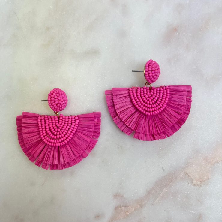 A photo of the Fan Out Earrings in Hot Pink product