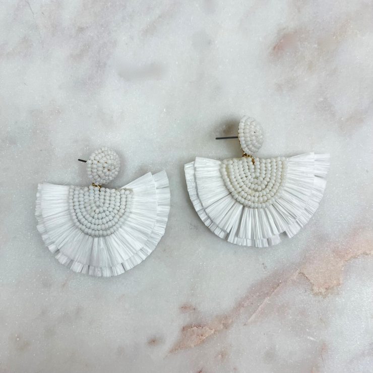 A photo of the Fan Out Earrings in White product