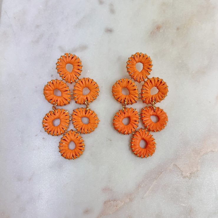 A photo of the Laney Earrings in Orange product