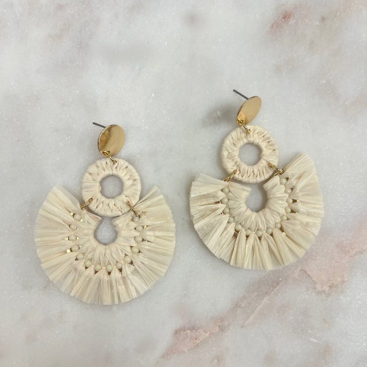 A photo of the Lolita Raffia Earrings in Beige product