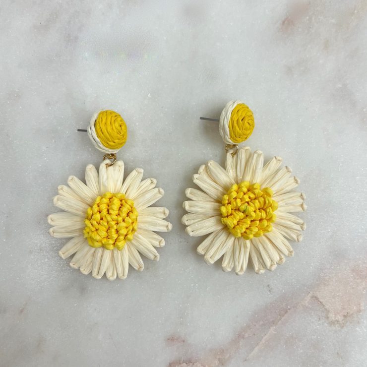 A photo of the Small Daisy Raffia Earrings in Ivory product