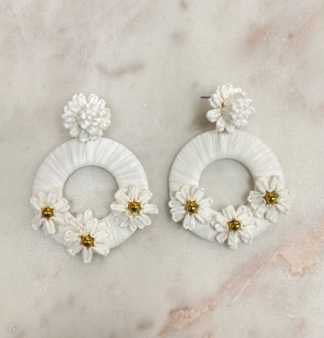 A photo of the Painted Daisy Earrings in White product