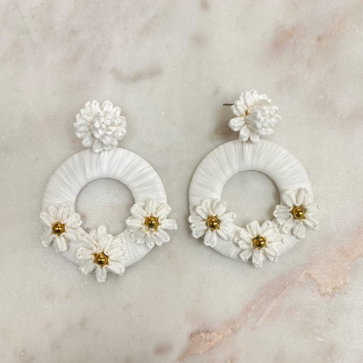 A photo of the Painted Daisy Earrings in White product