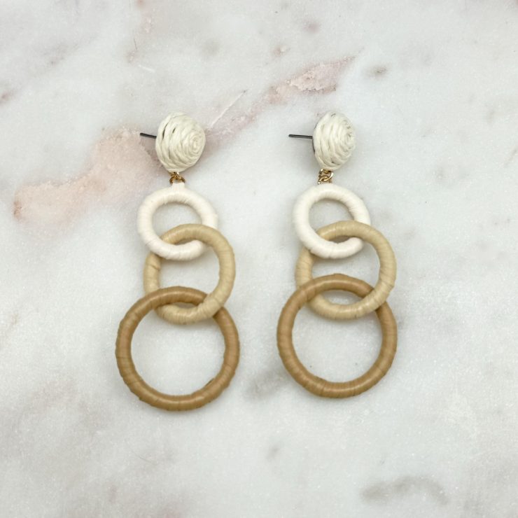 A photo of the Bunch of Circles Earrings in Beige product