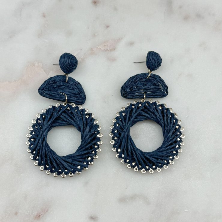 A photo of the Tropical Escape Earrings in Navy product