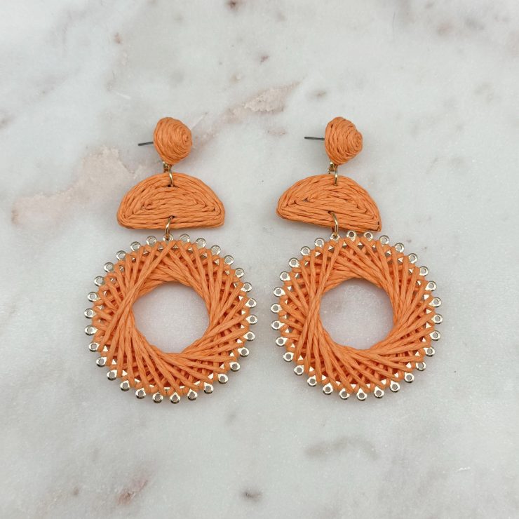 A photo of the Tropical Escape Earrings in Orange product