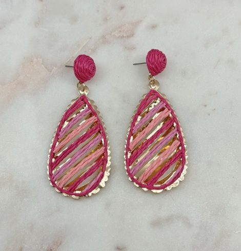 A photo of the Serena Raffia Earrings in Pink product