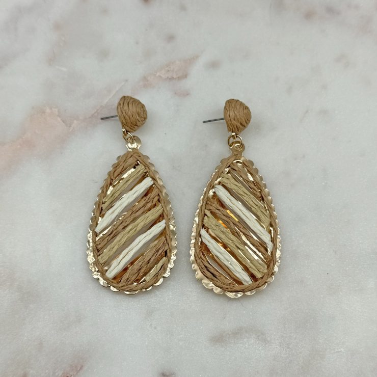 A photo of the Serena Raffia Earrings in Tan product