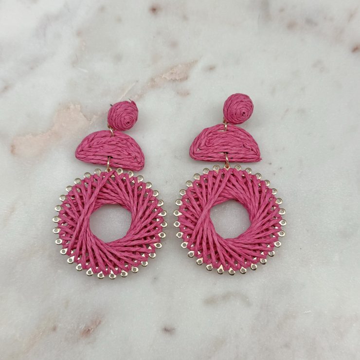 A photo of the Tropical Escape Earrings in Pink product