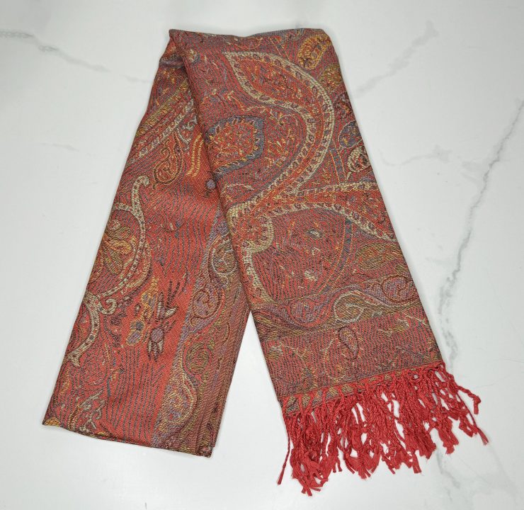 A photo of the Burnt Orange Paisley Pashmina product