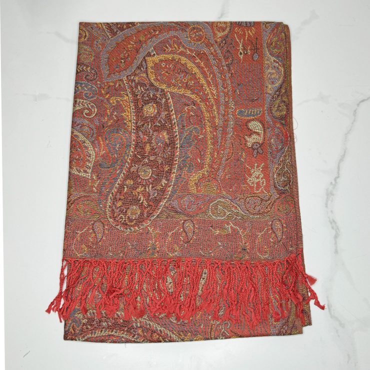 A photo of the Burnt Orange Paisley Pashmina product