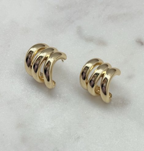 A photo of the Claw Earrings in Gold product