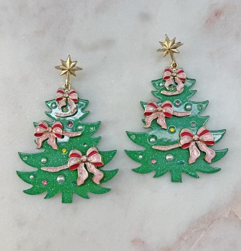 A photo of the Pink Bow Christmas Tree Earrings product