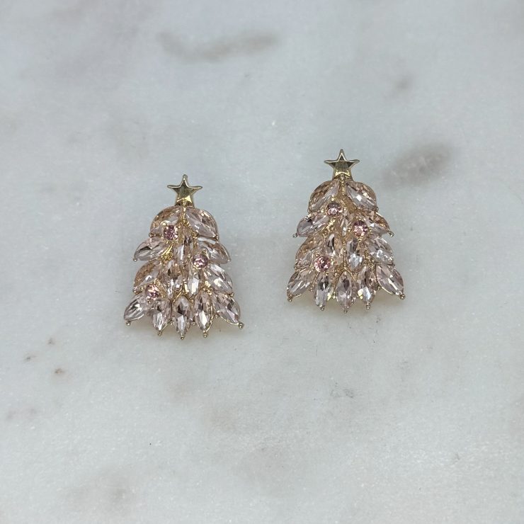 A photo of the Rhinestone Christmas Tree Studs in Pink product