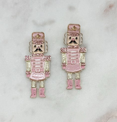 A photo of the Rosie Pink Nutcracker Earrings product