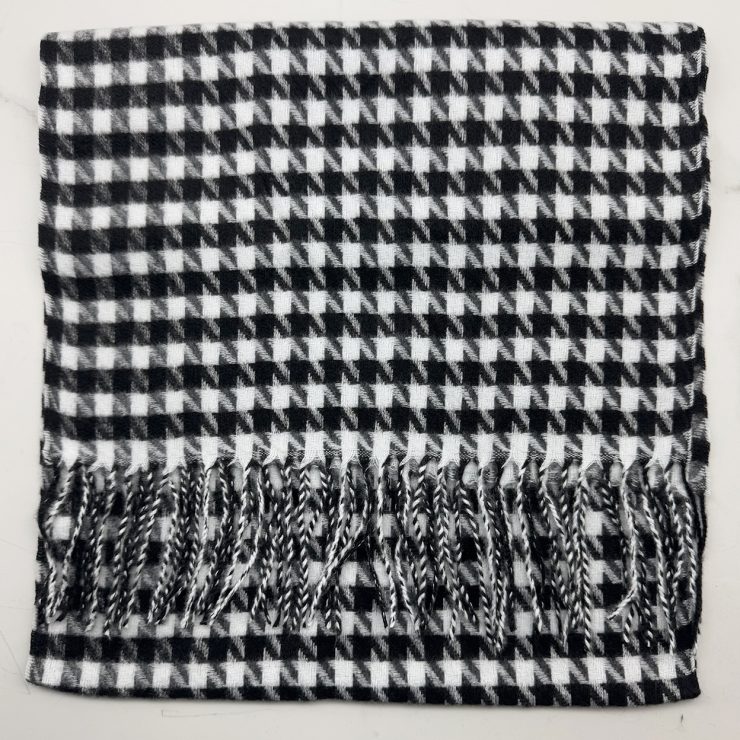 A photo of the Black & White Houndstooth Cashmere Feel Scarf product